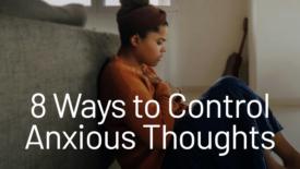 A woman sits on the floor leaning against a couch, holding her hands to her chest with a tense, anxious expression. Text on the image reads: ‘8 Ways to Control Anxious Thoughts.’